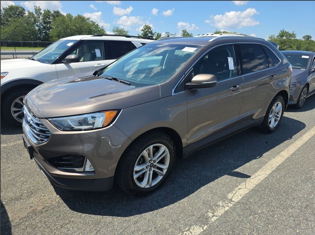 Used 2019 Stone Gray Metallic Ford SEL image 1