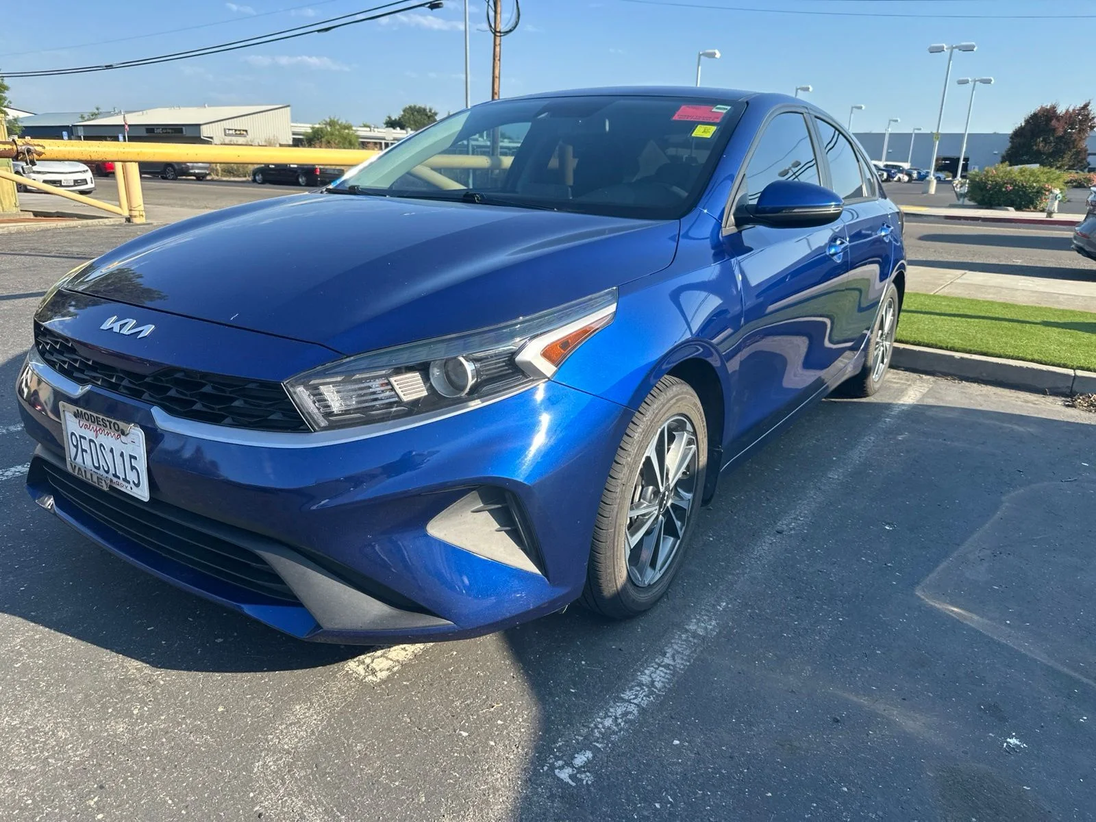 Used 2023 Deep Sea Blue Kia LXS image 1