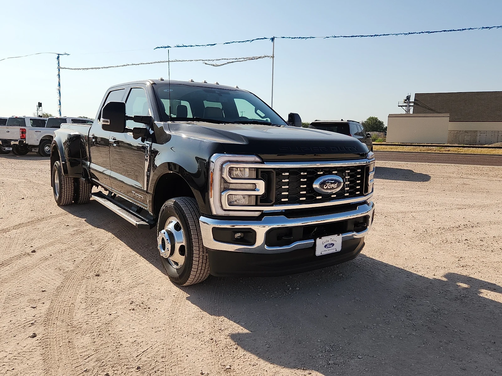 New 2026 Black Metallic Ford Lariat image 1