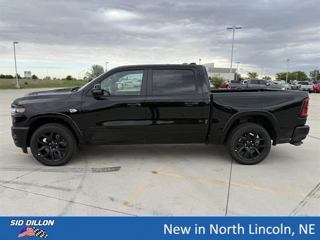 New 2026 Diamond Black Crystal Pearl-Coat Exterior Paint RAM Laramie image 2
