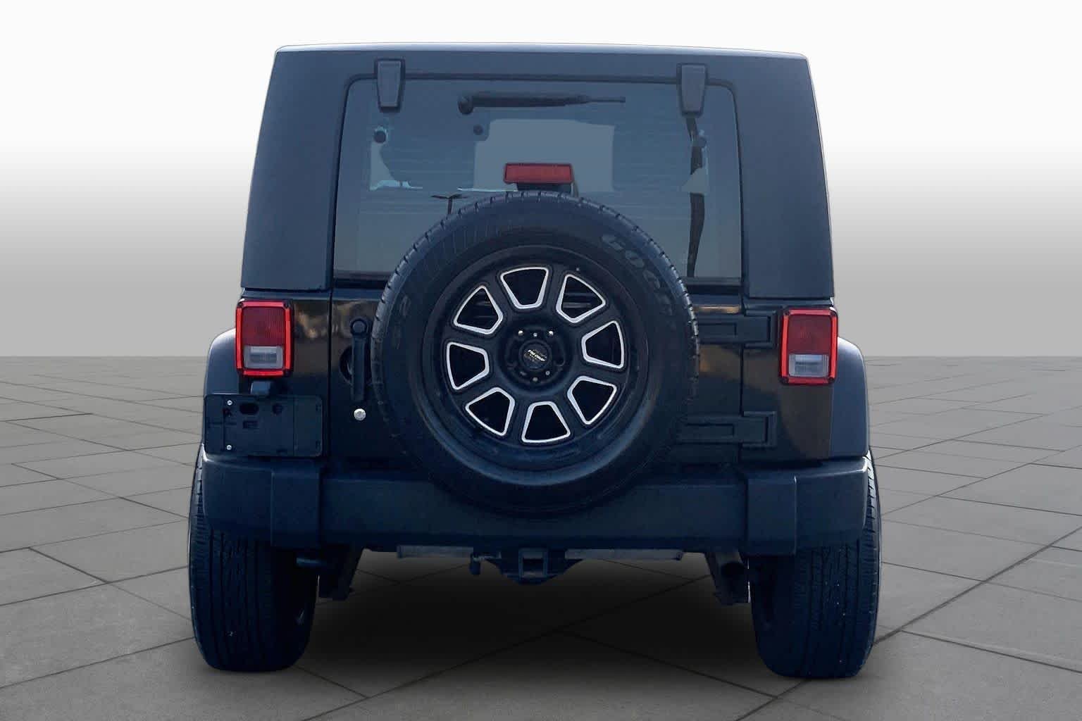 Used 2010 Black Jeep Sport image 4