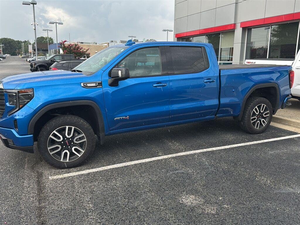 Used 2023 Dynamic Blue Metallic GMC AT4 image 1