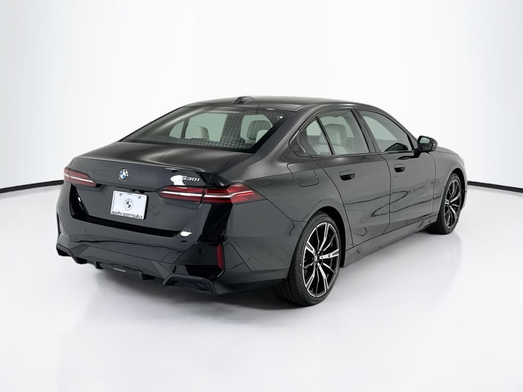 New 2027 Black Sapphire Metallic BMW 530i image 5