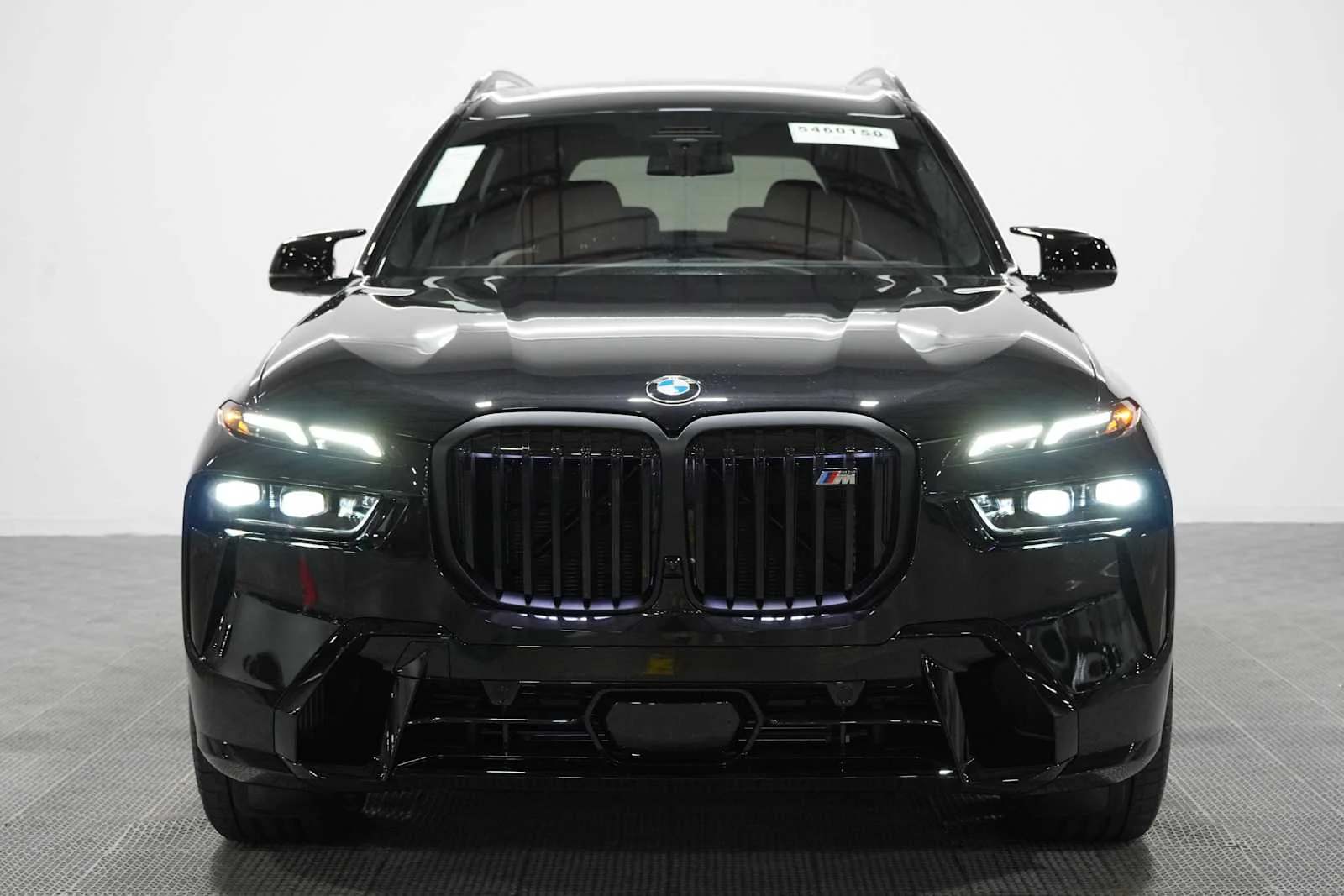 New 2027 Black Sapphire Metallic BMW M60i image 3