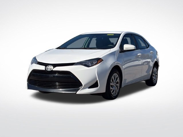 Used 2017 Super White Toyota LE image 1