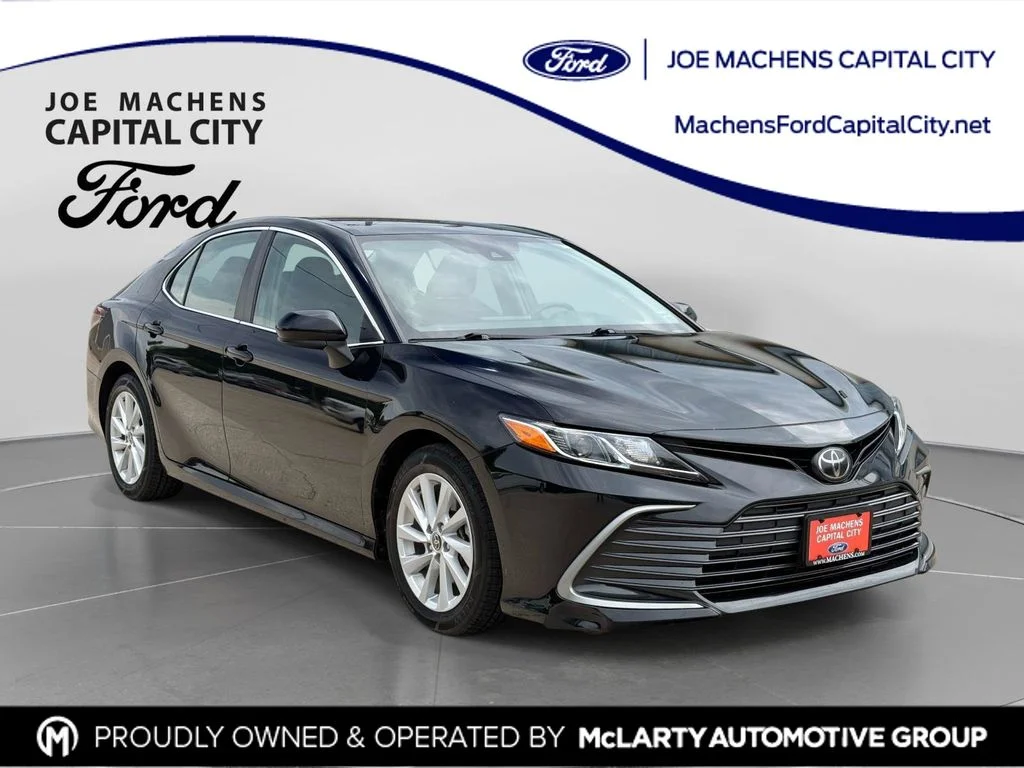 Used 2021 Midnight Black Metallic Toyota LE image 1