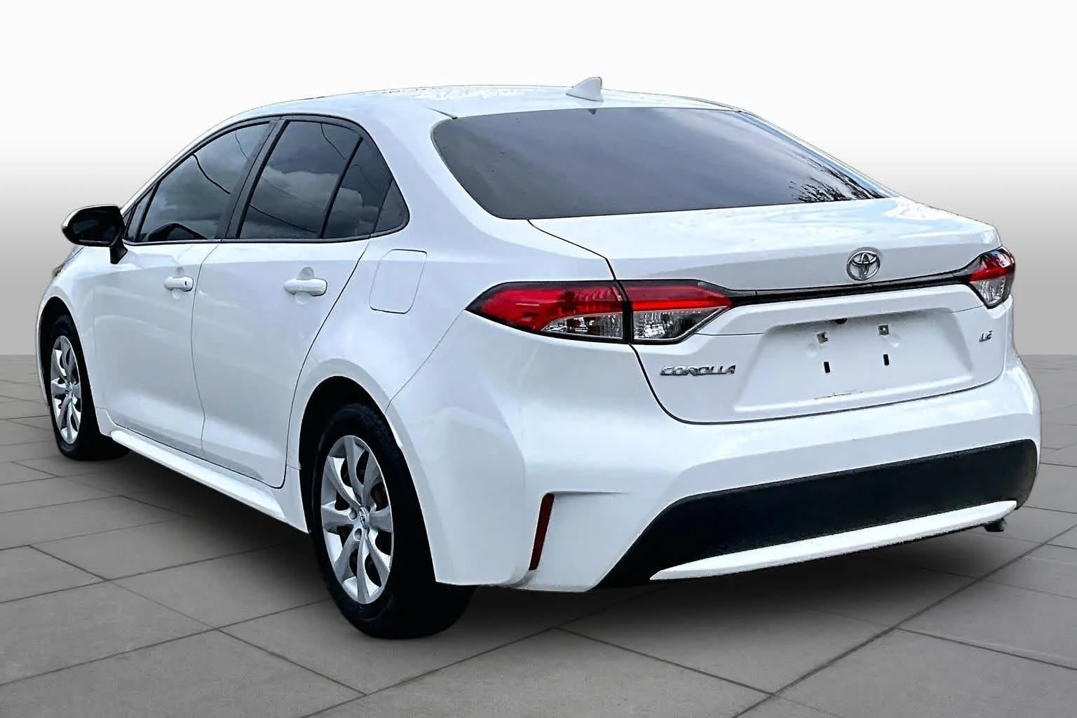 Used 2021 Super White Toyota LE image 12