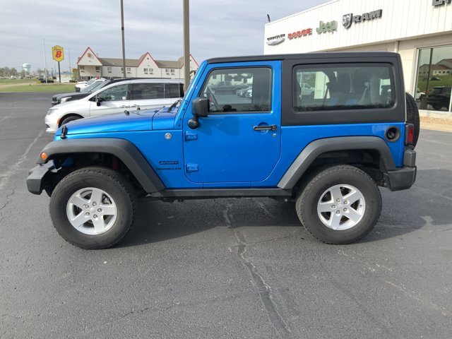 Used 2015 Jeep Wrangler Sport with VIN 1C4AJWAGXFL589145 for sale in Kansas City