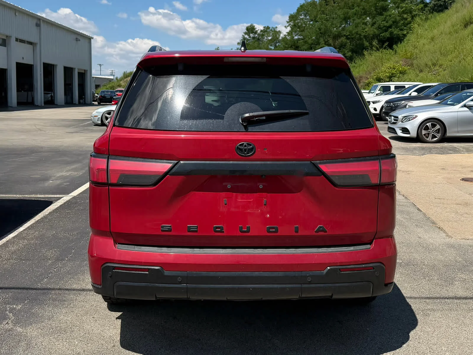 Used 2024 Supersonic Red Toyota Platinum image 4