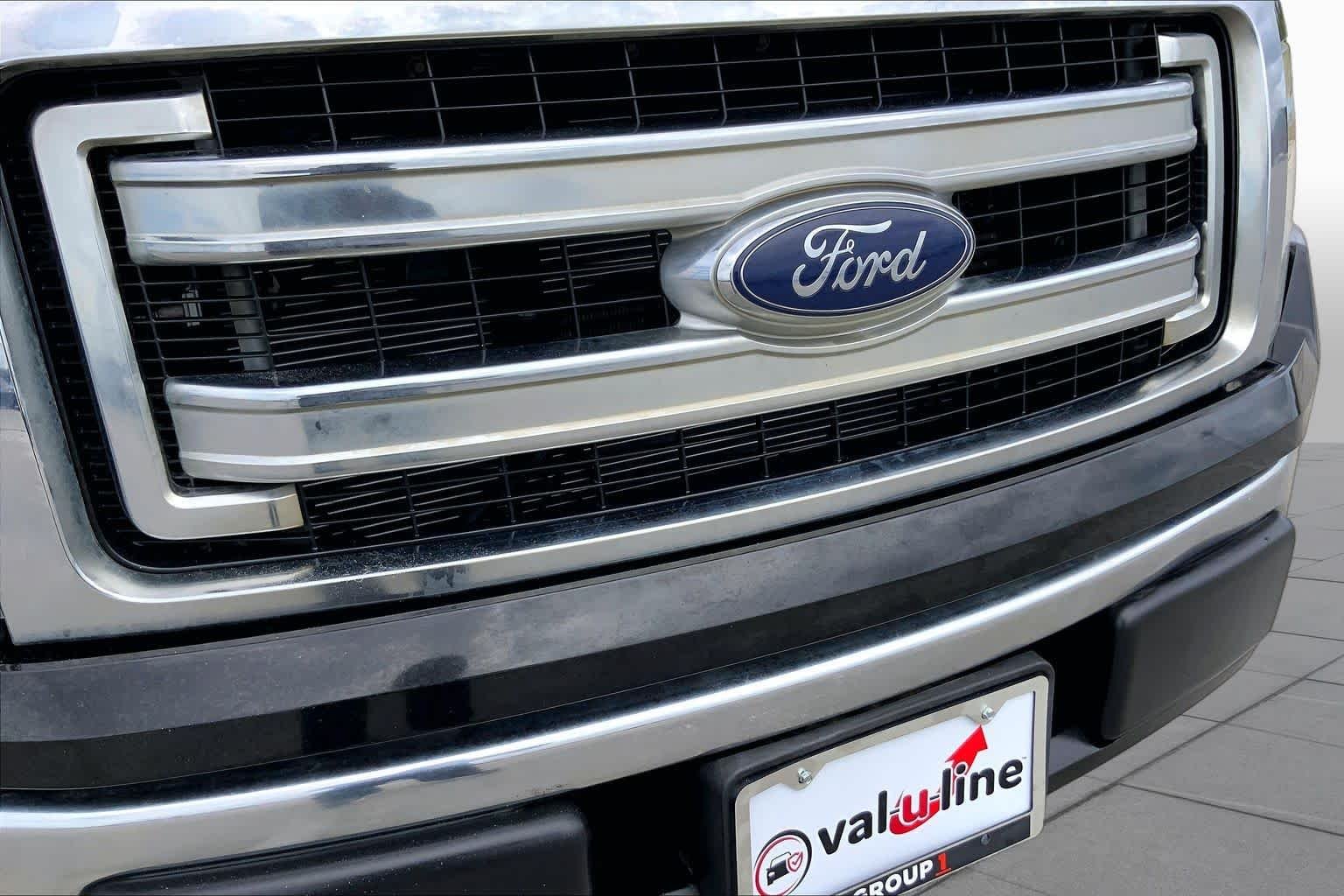 Used 2013 Tuxedo Black Metallic Ford XLT image 28