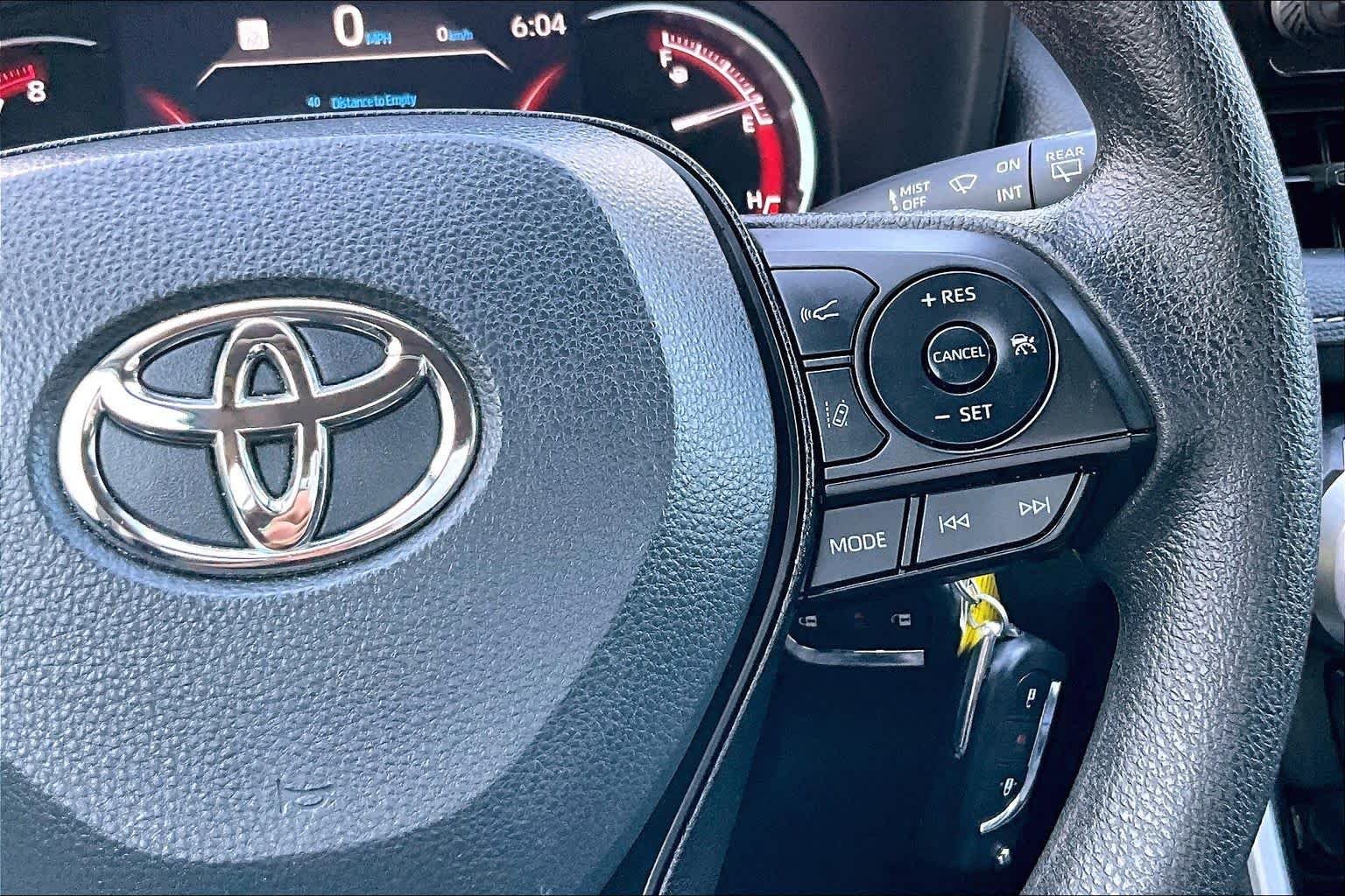 Used 2024 Midnight Black Metallic Toyota LE image 24