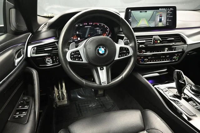 Used 2021 Black BMW M550i xDrive image 13