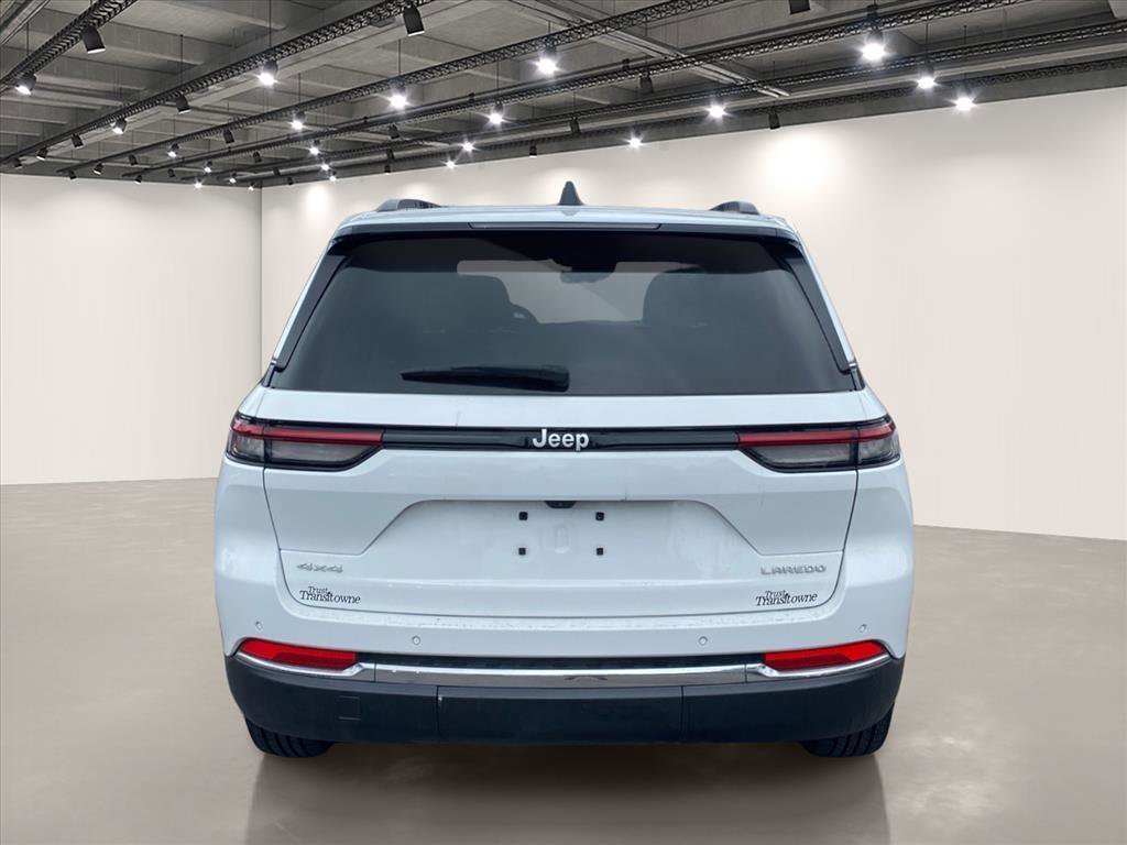 Used 2025 Bright White Clearcoat Jeep Laredo image 6