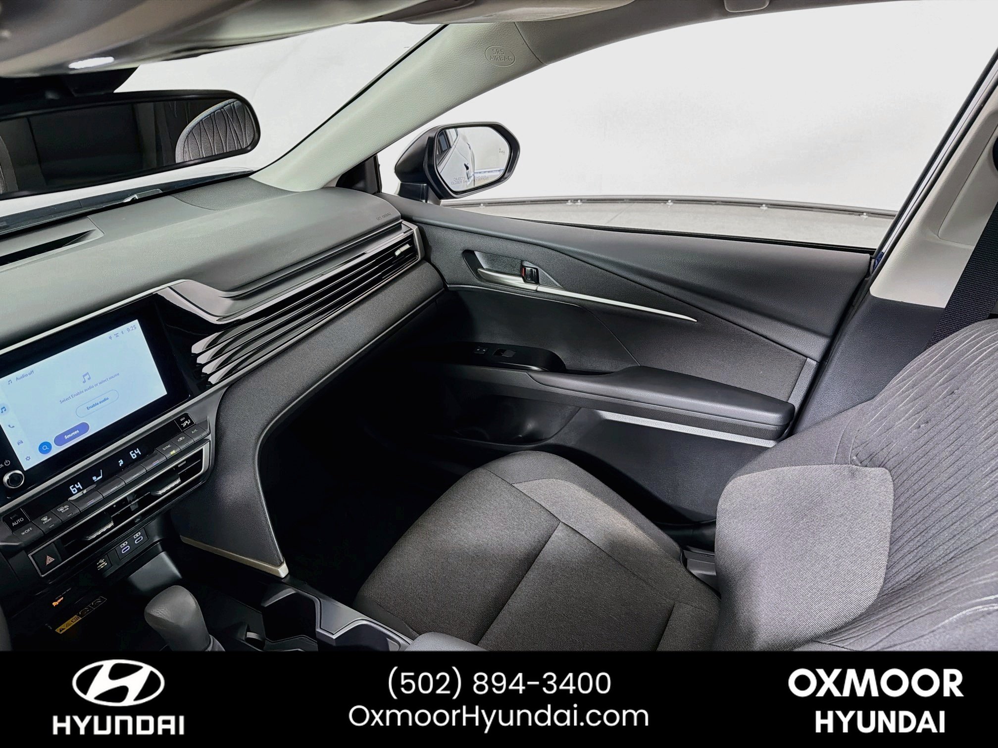 Used 2025 Reservoir Blue Toyota LE image 22