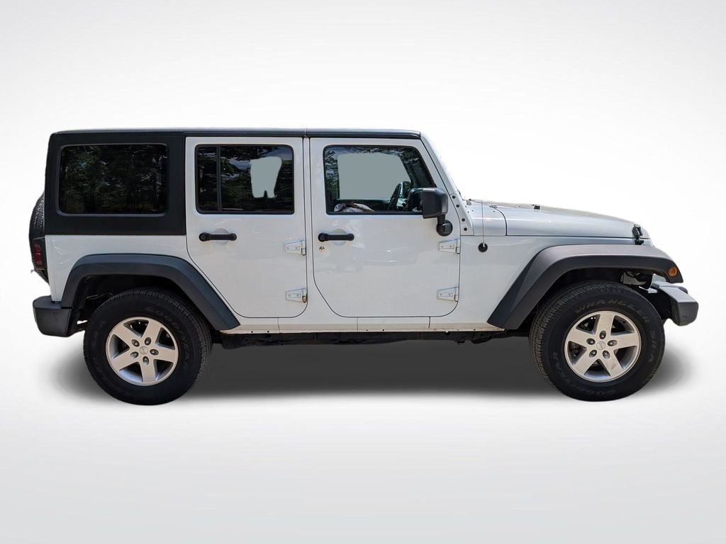 Used 2016 White Jeep Unlimited Sport image 2