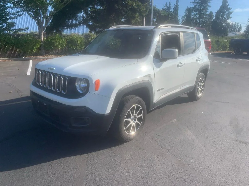 Used 2017 Alpine White Jeep Latitude image 1