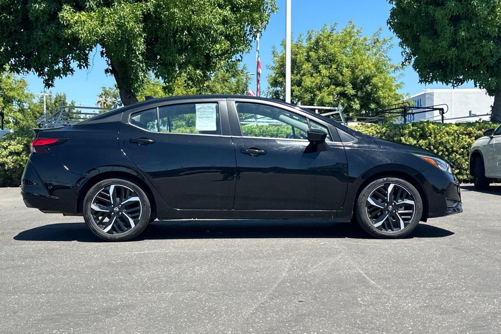 Used 2024 Super Black Nissan SR image 3