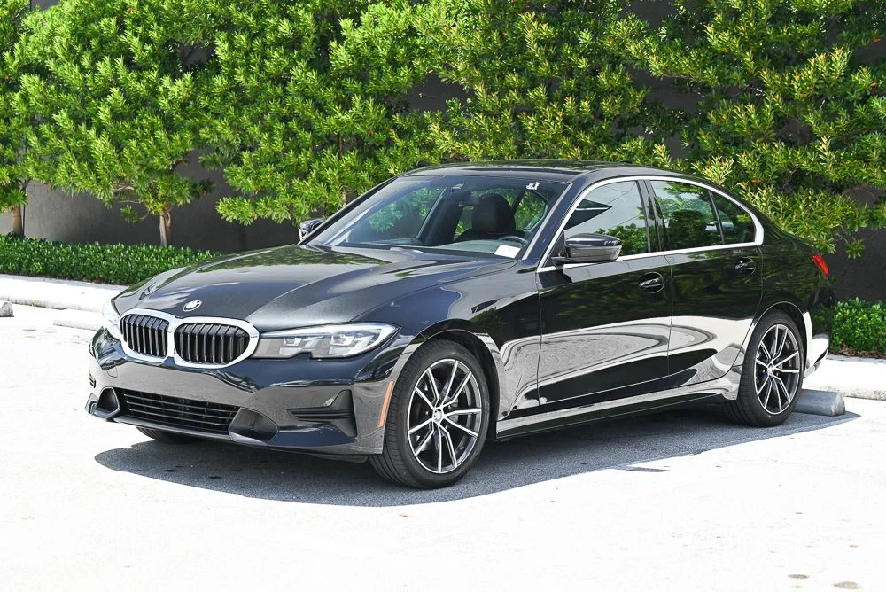 Used 2019 Black BMW 330i image 1