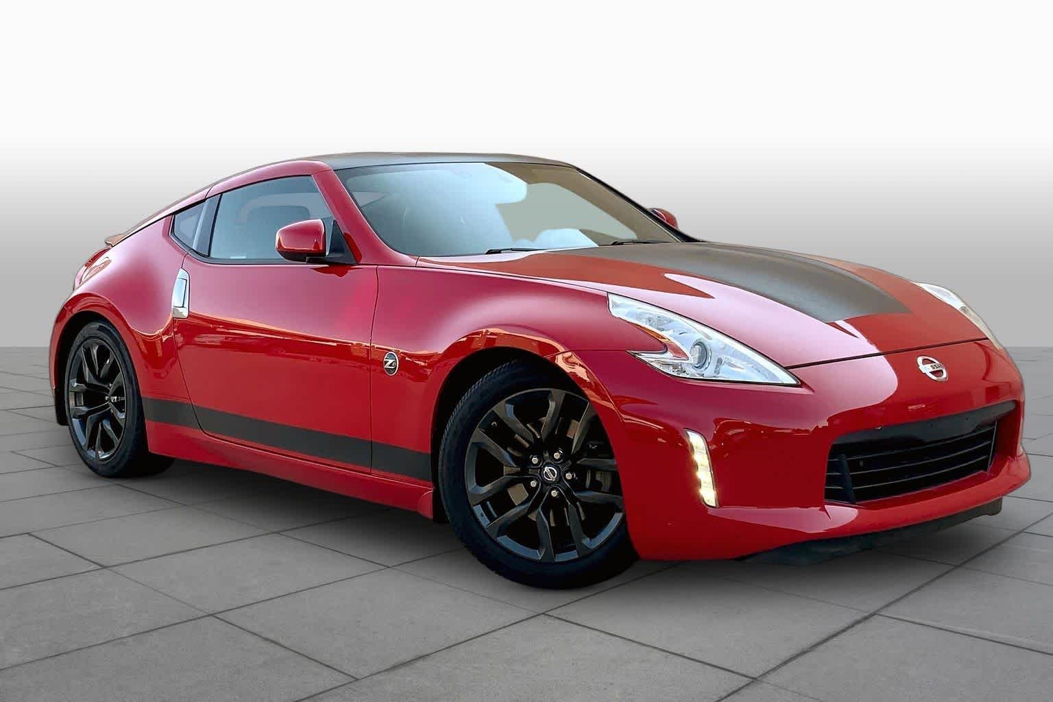 Used 2016 Solid Red Nissan Touring image 3