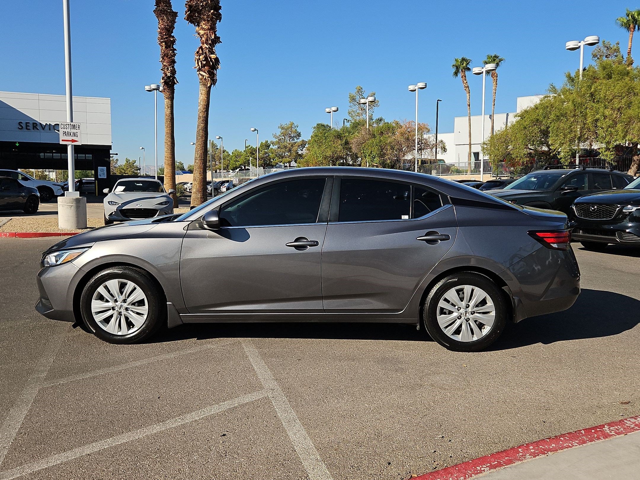 Used 2023 Gun Metallic Nissan S image 2