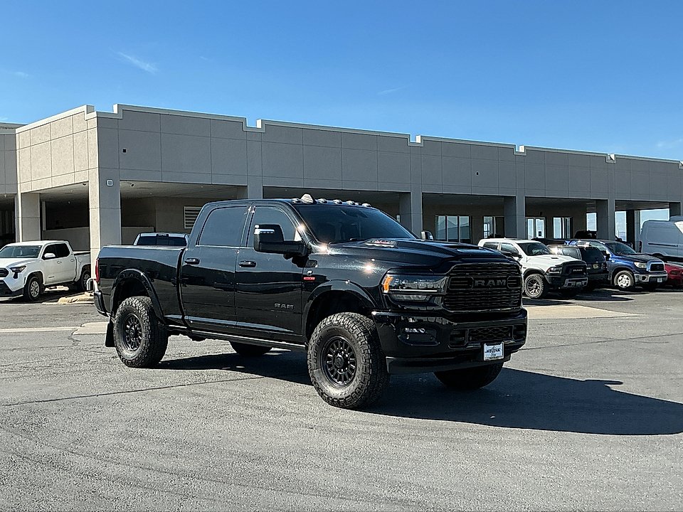Used 2024 Diamond Black Crystal Pearlcoat Ram Limited Crew Cab 4x4 6