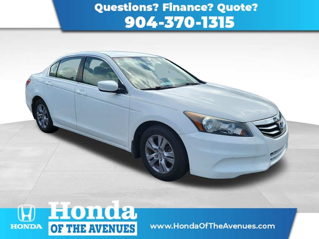 Used 2012 White Orchid Pearl Honda SE image 1