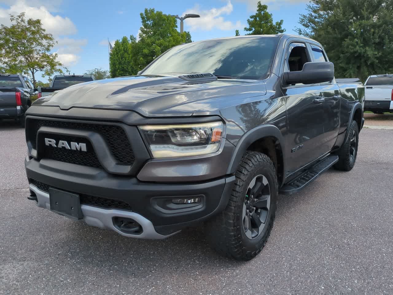 Used 2019 Granite Crystal Metallic Clearcoat Ram Rebel image 2