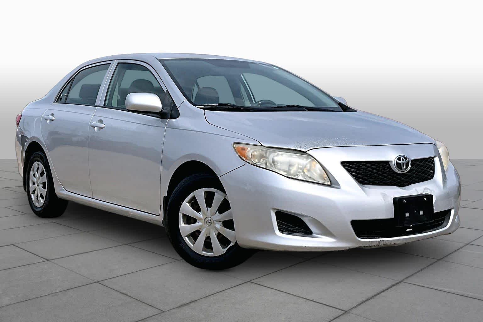 Used 2009 Classic Silver Metallic Toyota LE image 2