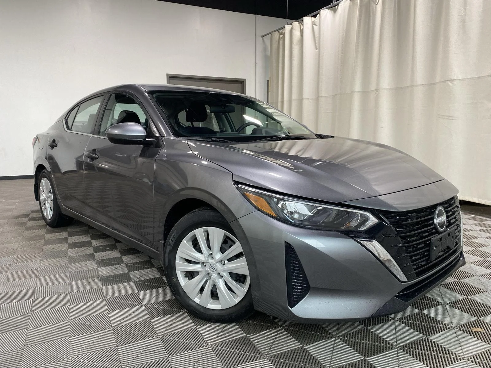 Used 2024 Gun Metallic Nissan S image 1