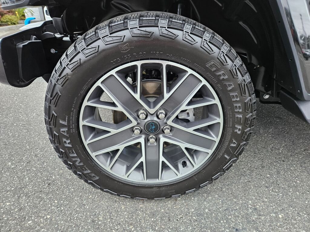 Used 2024 Black Clear Coat Jeep High Altitude 4xe image 9
