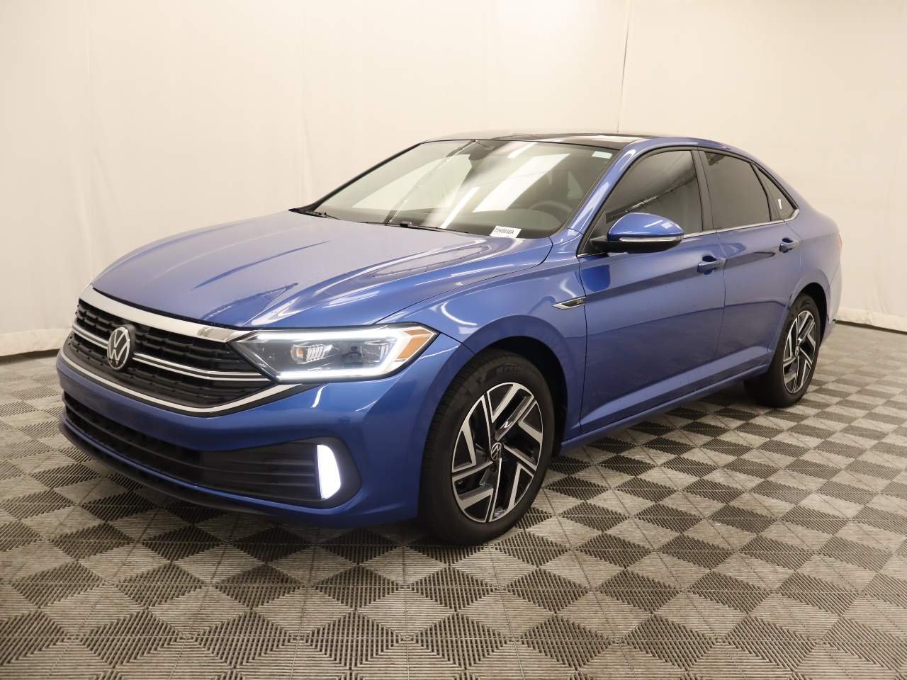 Certified Used 2024 Rising Blue Metallic Volkswagen SEL image 1