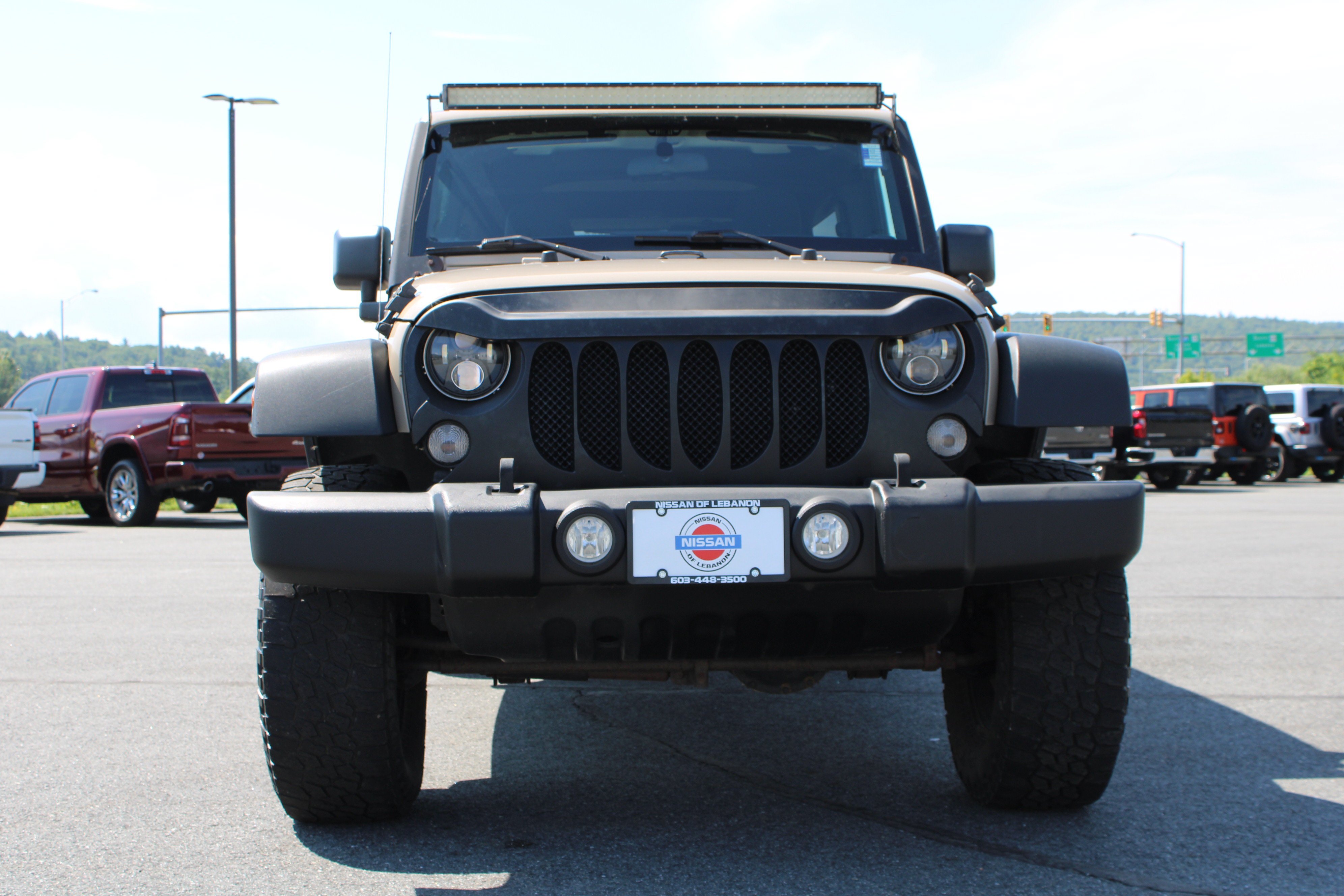 Used 2016 Mojave Sand Clearcoat Jeep Sport image 3