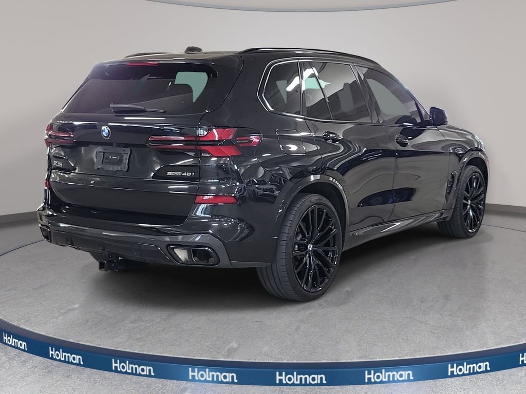 Certified Used 2025 Black Sapphire Metallic BMW sDrive40i image 7