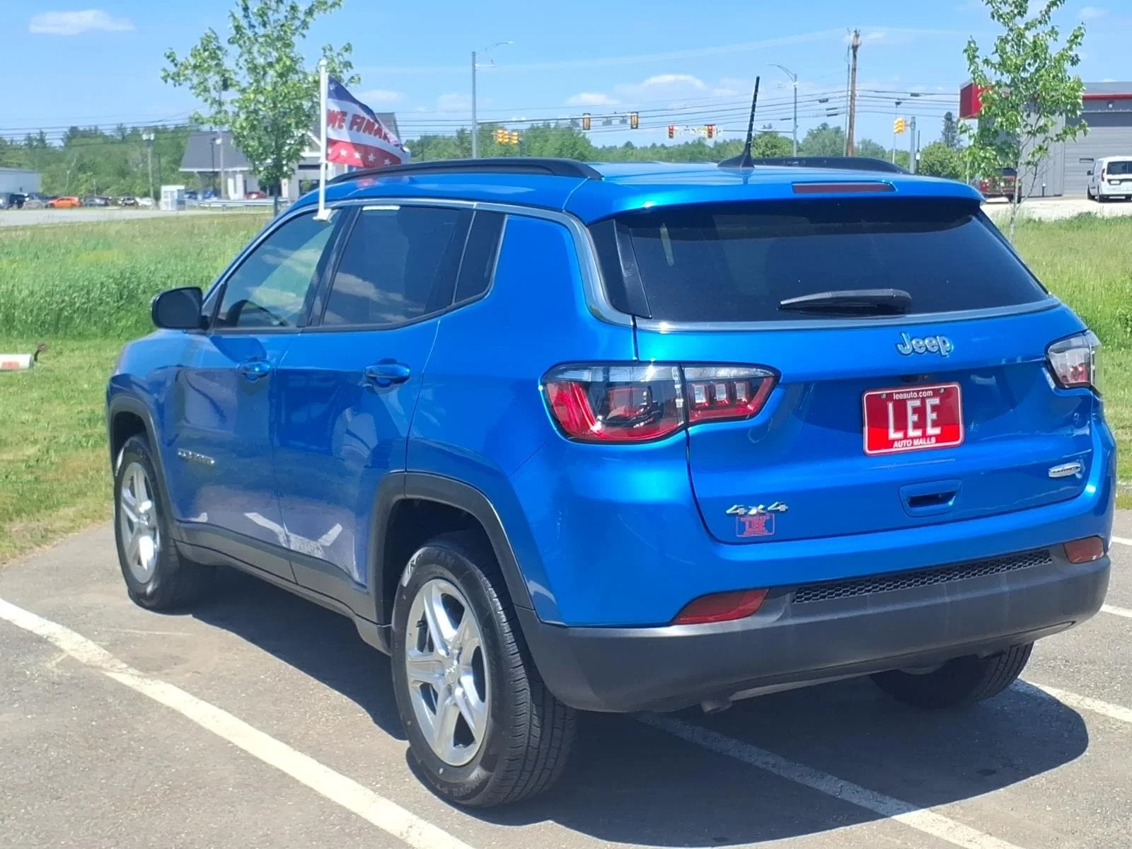 Used 2024 Blue Pearl Jeep Latitude image 7