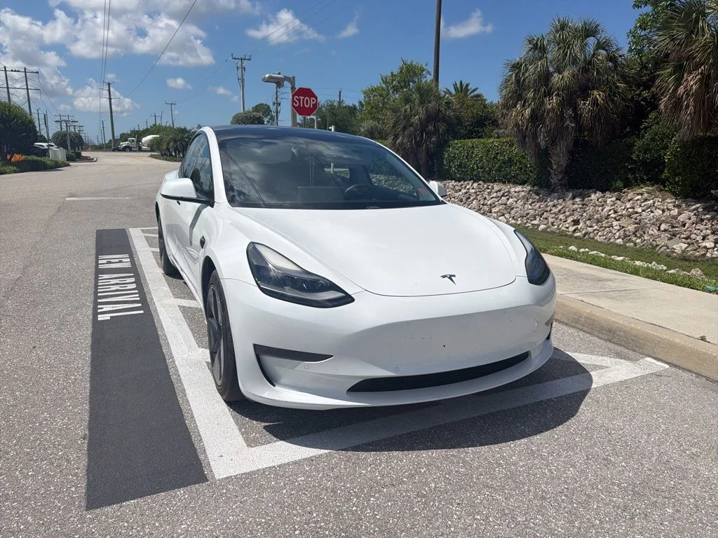 Used 2021 Tesla Model 3 Base with VIN 5YJ3E1EA2MF077823 for sale in Naples, FL