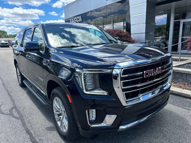 Used 2022 Midnight Blue Metallic GMC SLT image 1