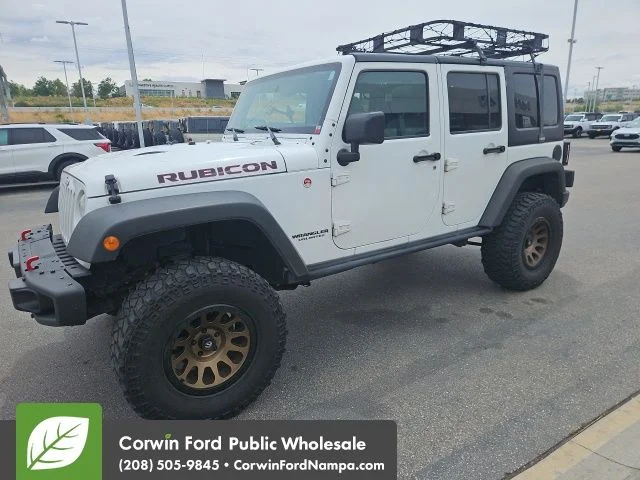 Used 2016 White Jeep Unlimited Rubicon image 1