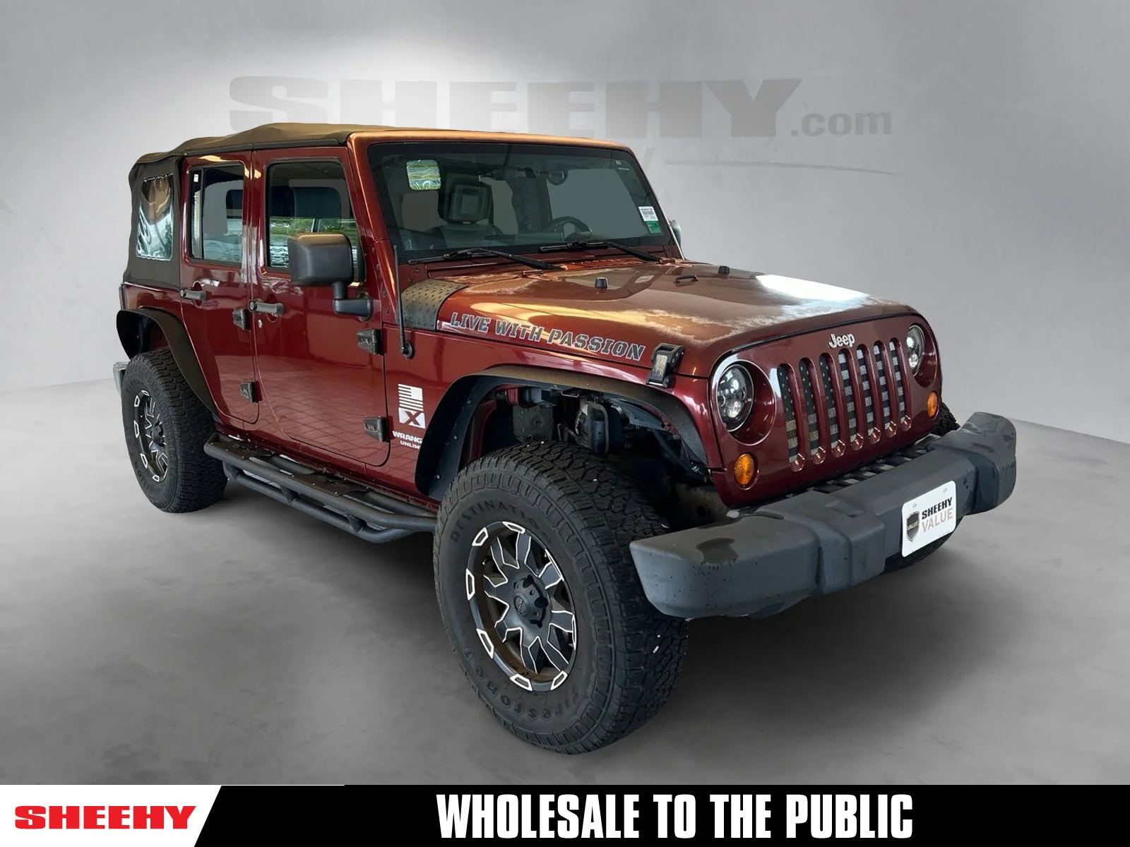 Used 2007 Red Rock Crystal Pearlcoat Jeep Unlimited X image 1