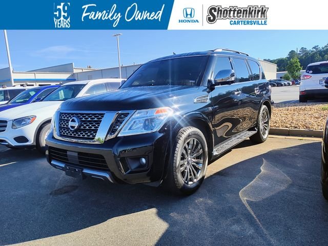 Used 2019 Black Nissan Platinum image 1