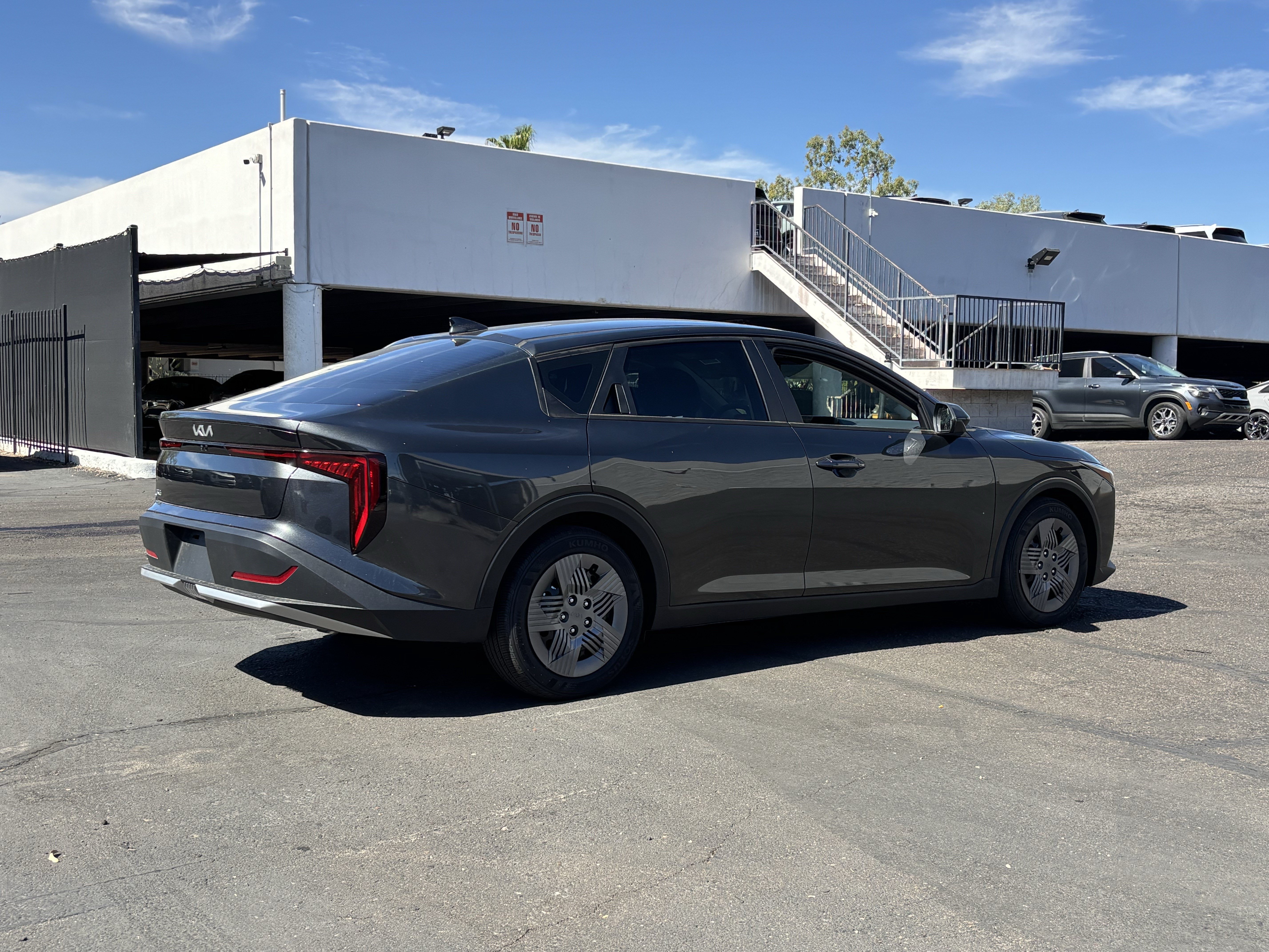 New 2026 Interstellar Gray Kia LX image 3