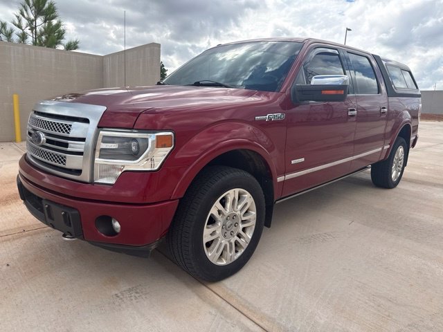Used 2014 Red Ford Platinum image 1