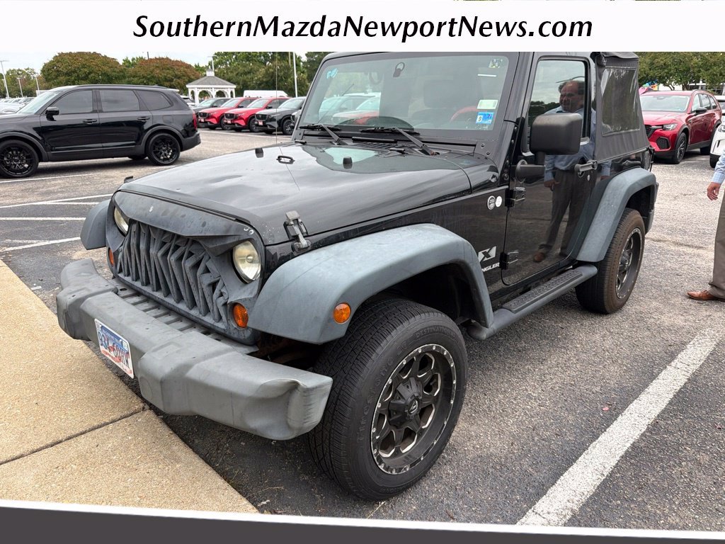 Used 2008 Black Jeep X image 1