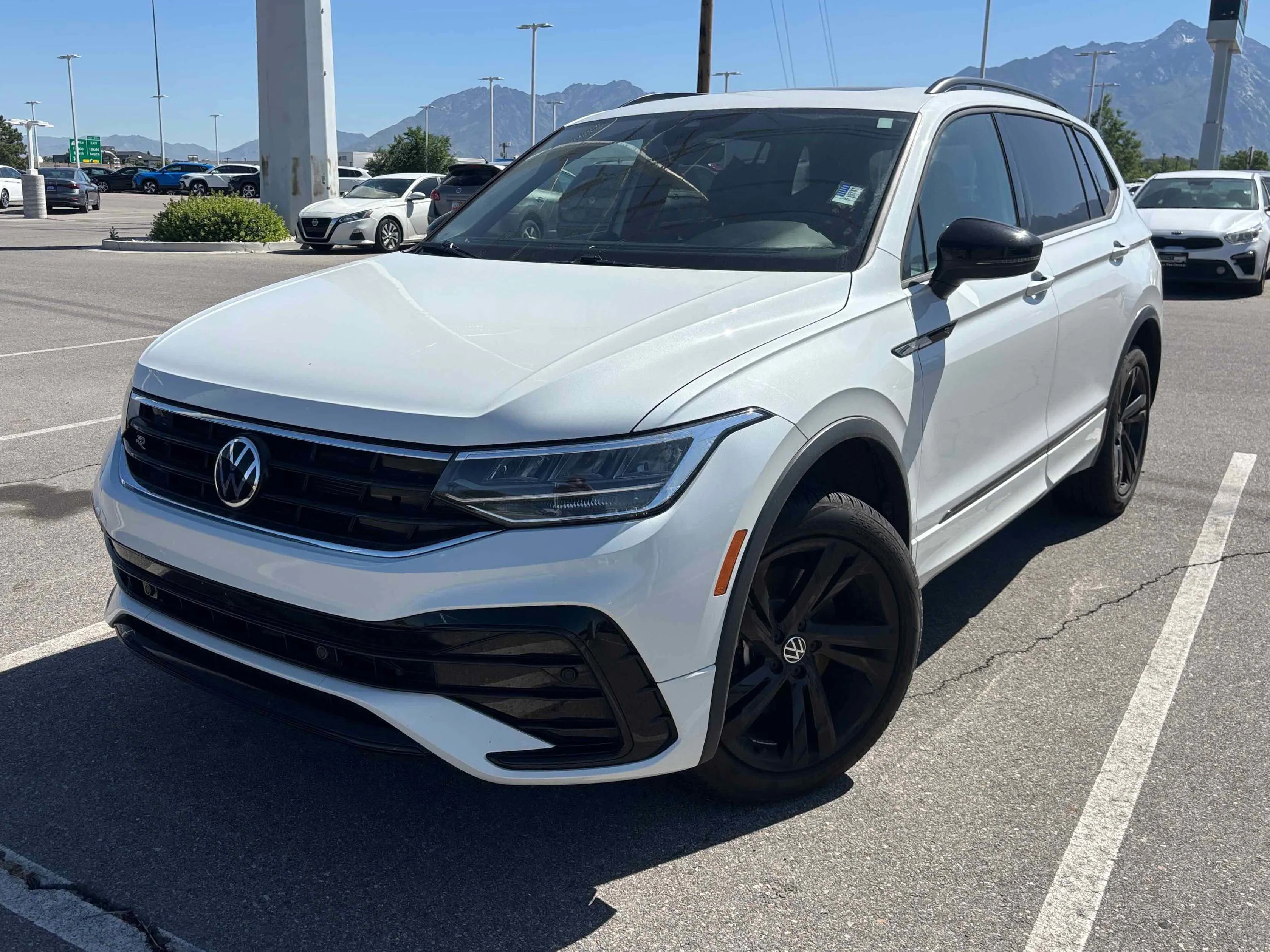 Used 2024 Opal White Volkswagen SE R-Line Black image 1