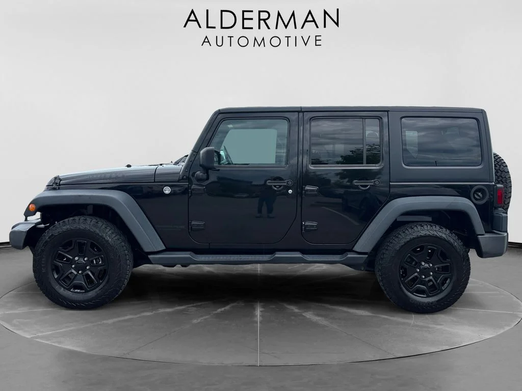 Used 2018 Black Jeep Unlimited Sport image 2