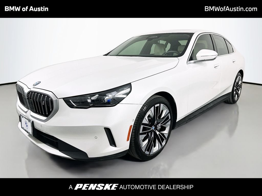 Certified Used 2025 Mineral White Metallic BMW eDrive40 image 1