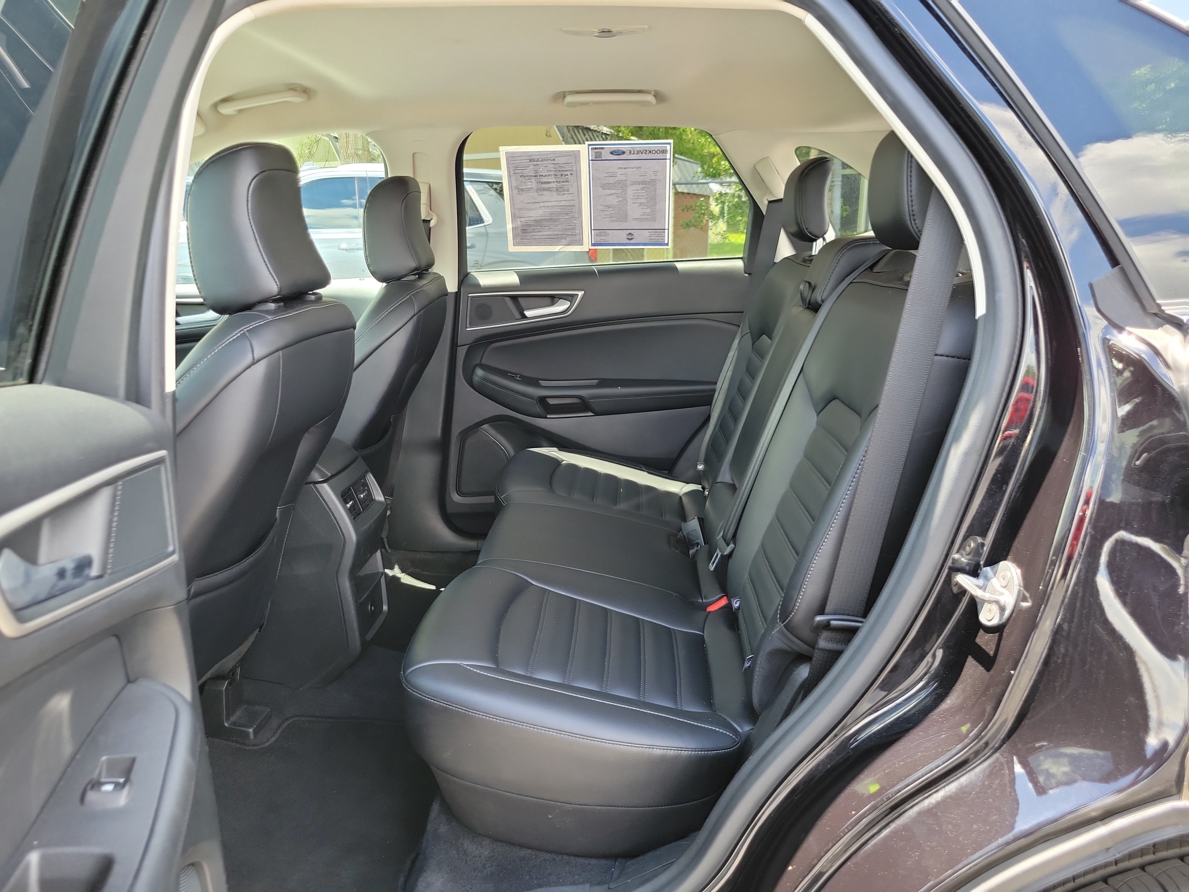 Used 2024 Agate Black Metallic Ford SEL image 21
