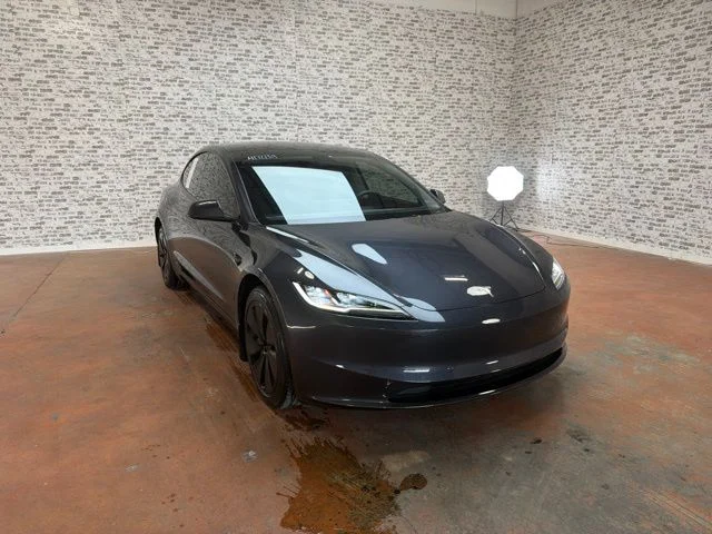 Used 2025 Stealth Gray Tesla  image 1