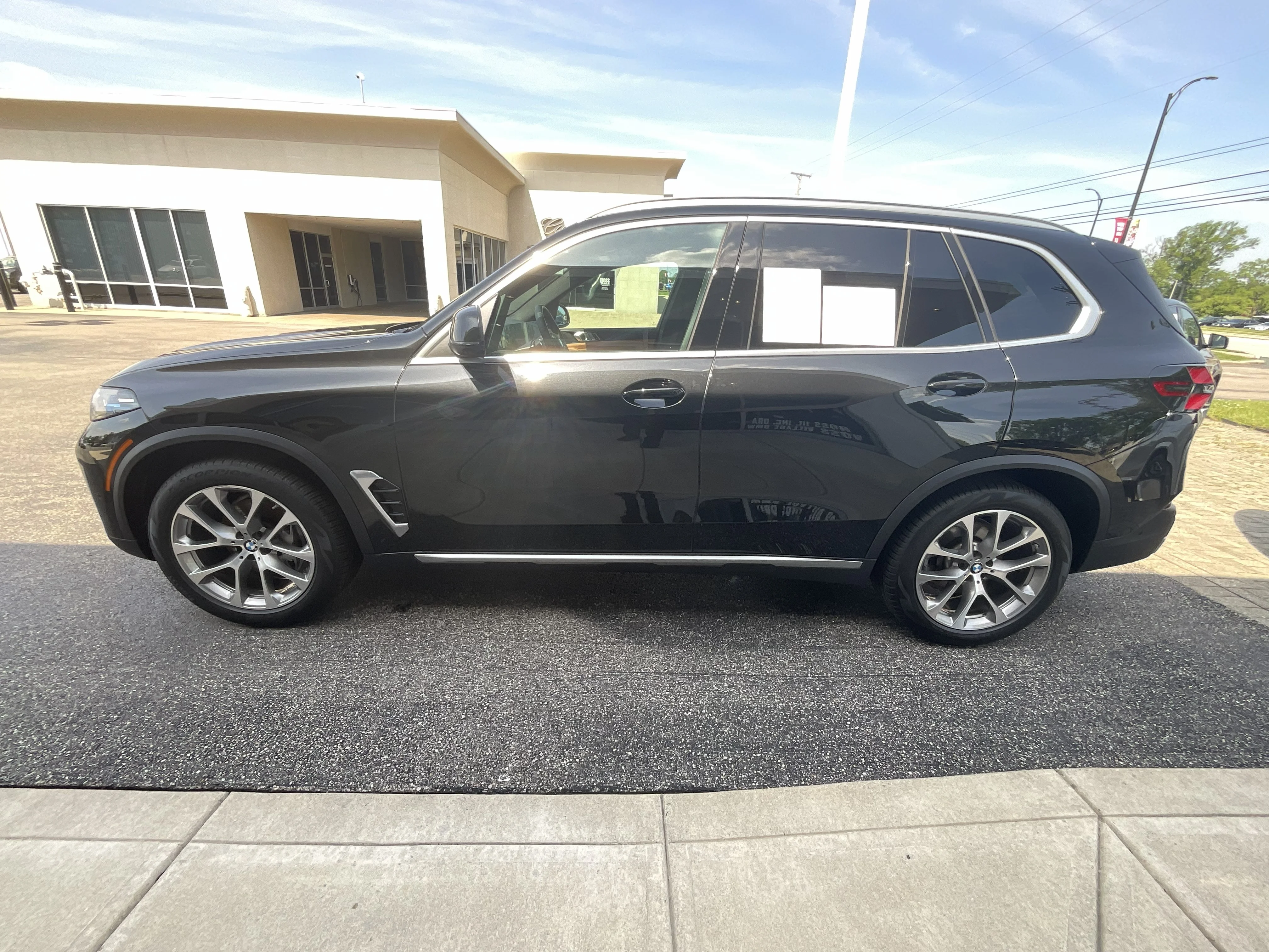 Certified Used 2024 Black Sapphire Metallic BMW xDrive40i image 4