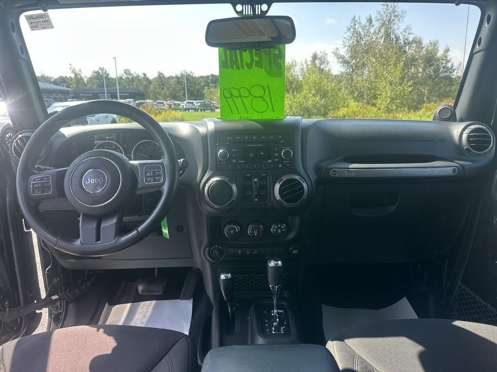 Used 2014 Black Jeep Unlimited Sport image 10