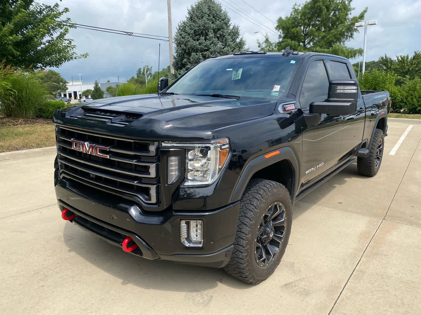 Used 2021 GMC Sierra 2500HD AT4 with VIN 1GT49PEY6MF250828 for sale in Kansas City